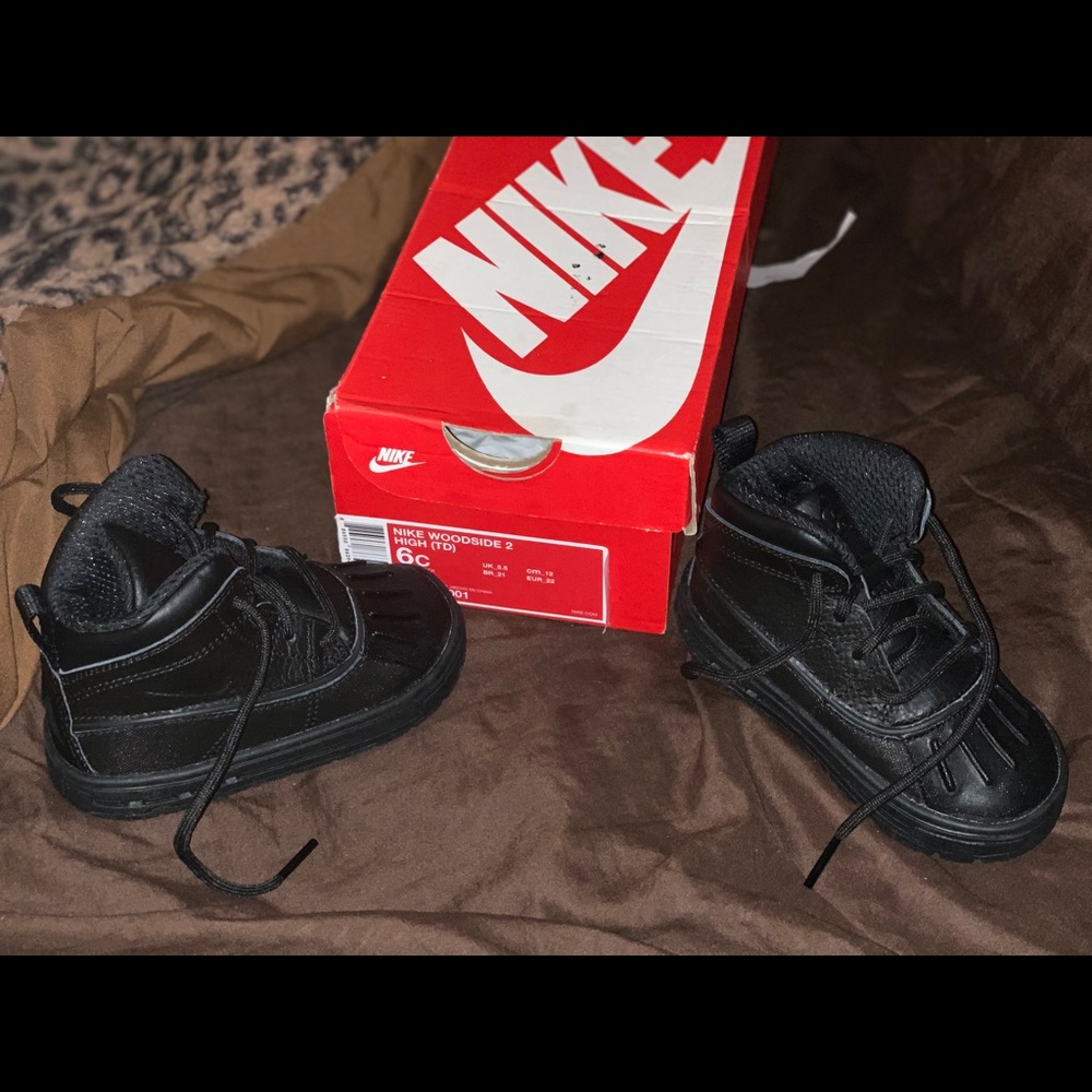 All black nike boot